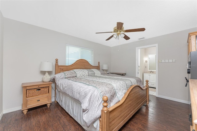 2008 Pellam Blvd, Port Charlotte, FL 33948 - bedroom featuring baseboards, dark wood-style flooring, and ensuite bathroom