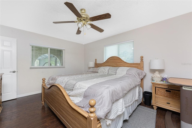 2008 Pellam Blvd, Port Charlotte, FL 33948 - bedroom with wood finished floors, baseboards, a ceiling fan, and a textured ceiling