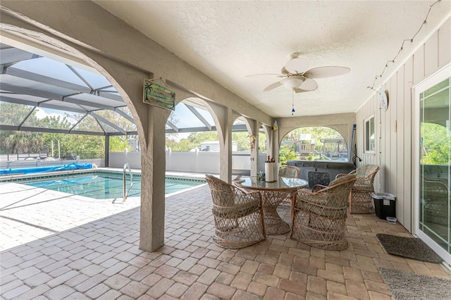 2008 Pellam Blvd, Port Charlotte, FL 33948 - view of pool with ceiling fan, a patio area, glass enclosure, and fence