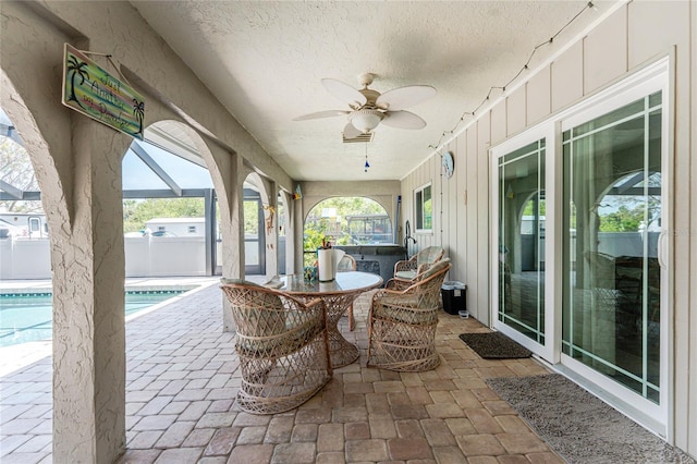 2008 Pellam Blvd, Port Charlotte, FL 33948 - sunroom featuring a ceiling fan and outdoor dining space