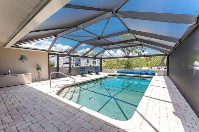 2008 Pellam Blvd, Port Charlotte, FL 33948 - view of pool with a patio area, a covered pool, a hot tub, and glass enclosure