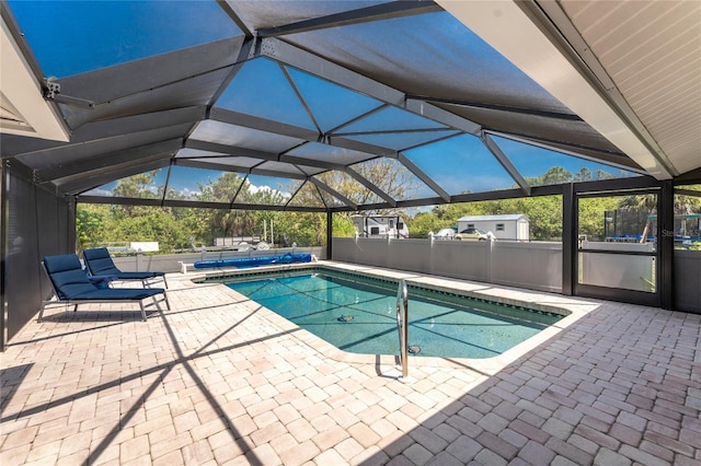 2008 Pellam Blvd, Port Charlotte, FL 33948 - swimming pool featuring a patio and glass enclosure