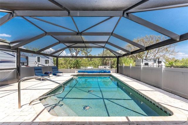 2008 Pellam Blvd, Port Charlotte, FL 33948 - outdoor pool featuring a patio area, fence, a hot tub, and a lanai