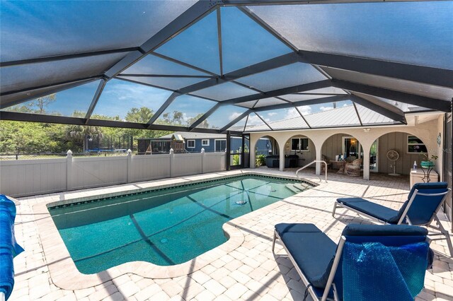 2008 Pellam Blvd, Port Charlotte, FL 33948 - swimming pool with a patio area, fence, and a lanai