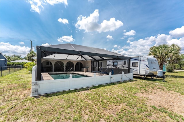 2008 Pellam Blvd, Port Charlotte, FL 33948 - back of house featuring glass enclosure