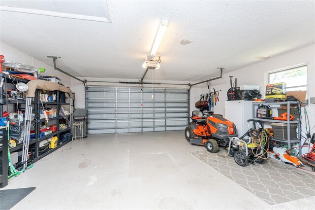 2008 Pellam Blvd, Port Charlotte, FL 33948 - garage featuring a garage door opener