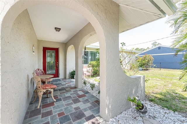 2008 Pellam Blvd, Port Charlotte, FL 33948 - view of exterior entry featuring stucco siding