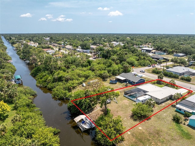 2008 Pellam Blvd, Port Charlotte, FL 33948 - aerial view of residential area featuring a nearby body of water and property parcel outlined