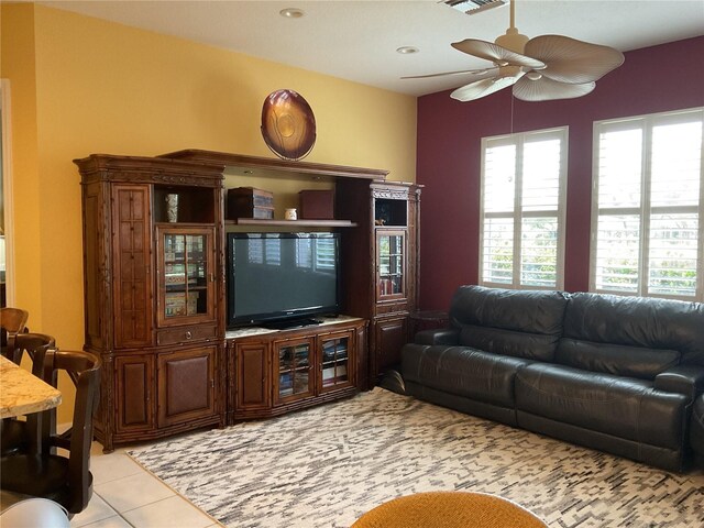 1961 Palo Duro Blvd, North Fort Myers, FL 33917 - living room with a ceiling fan and light tile patterned floors