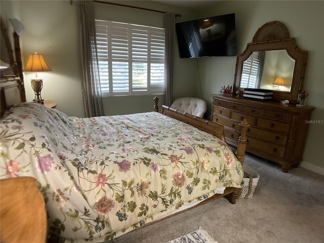 1961 Palo Duro Blvd, North Fort Myers, FL 33917 - carpeted bedroom featuring multiple windows