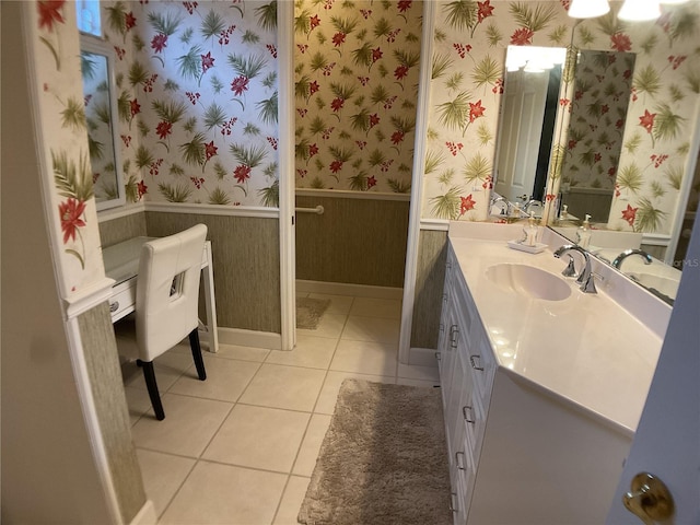 1961 Palo Duro Blvd, North Fort Myers, FL 33917 - bathroom with tile patterned floors, vanity, baseboards, and wallpapered walls