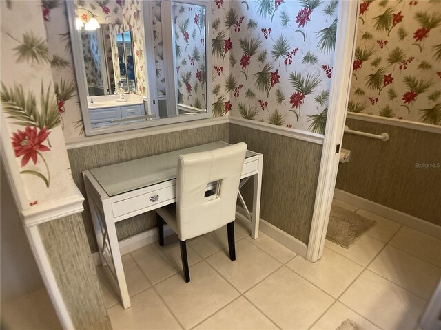 1961 Palo Duro Blvd, North Fort Myers, FL 33917 - bathroom with wallpapered walls, tile patterned flooring, and baseboards
