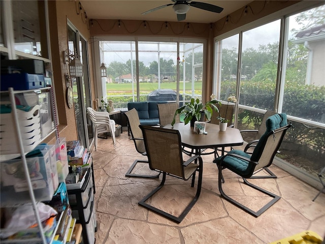 1961 Palo Duro Blvd, North Fort Myers, FL 33917 - sunroom / solarium with ceiling fan, plenty of natural light, and an outdoor living space