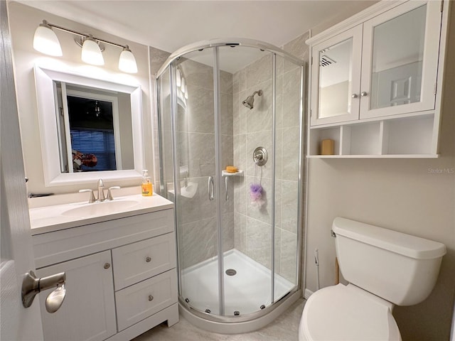 4158 Tamiami Trl Unit A5, Port Charlotte, FL 33952 - bathroom featuring a stall shower, vanity, and toilet