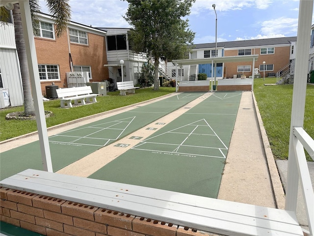 4158 Tamiami Trl Unit A5, Port Charlotte, FL 33952 - surrounding community featuring a lawn and shuffleboard