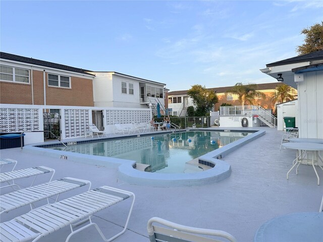 4158 Tamiami Trl Unit A5, Port Charlotte, FL 33952 - community pool with stairs and central air condition unit