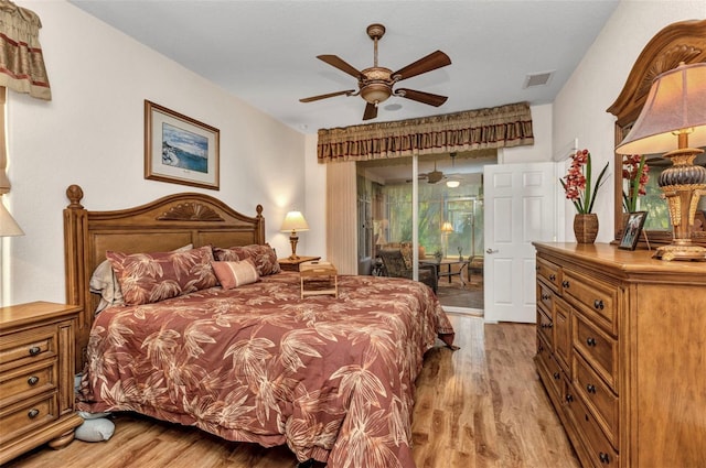 24371 Folkstone Ave, Punta Gorda, FL 33980 - bedroom with access to exterior, light wood finished floors, and ceiling fan
