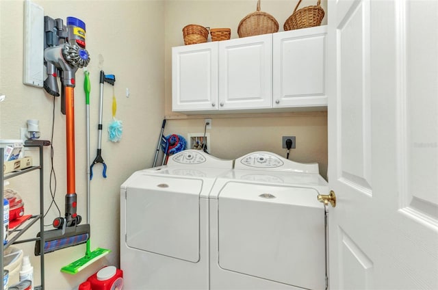 24371 Folkstone Ave, Punta Gorda, FL 33980 - laundry area with cabinet space and washer and dryer