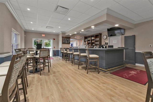24371 Folkstone Ave, Punta Gorda, FL 33980 - indoor dry bar with light wood-type flooring, ornamental molding, baseboards, recessed lighting, and a paneled ceiling