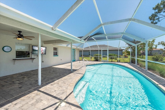 25449 Doredo Dr, Punta Gorda, FL 33955 - outdoor pool featuring a patio, ceiling fan, and a lanai