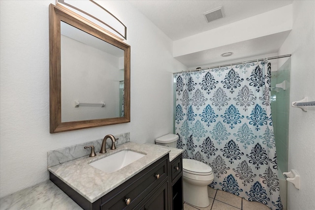 25449 Doredo Dr, Punta Gorda, FL 33955 - full bath with toilet, vanity, tile patterned floors, and curtained shower