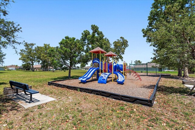 25449 Doredo Dr, Punta Gorda, FL 33955 - community playground featuring a lawn