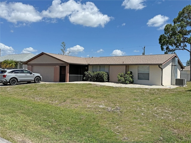 23269 Lehigh Ave, Port Charlotte, FL 33954 - single story home featuring a garage, a front yard, central air condition unit, and a shingled roof