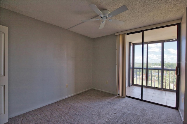 3006 Caring Way Unit 615, Port Charlotte, FL 33952 - unfurnished room featuring carpet, a ceiling fan, and baseboards