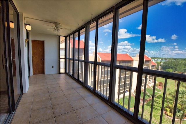 3006 Caring Way Unit 615, Port Charlotte, FL 33952 - unfurnished sunroom featuring tile patterned flooring and floor to ceiling windows