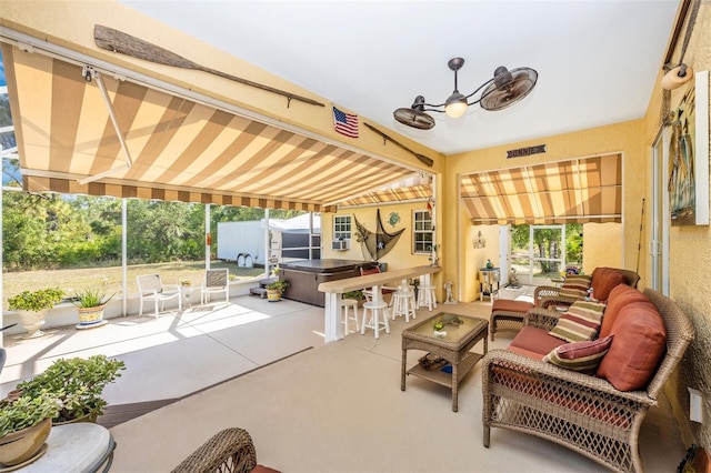 sunroom with an outdoor hangout area