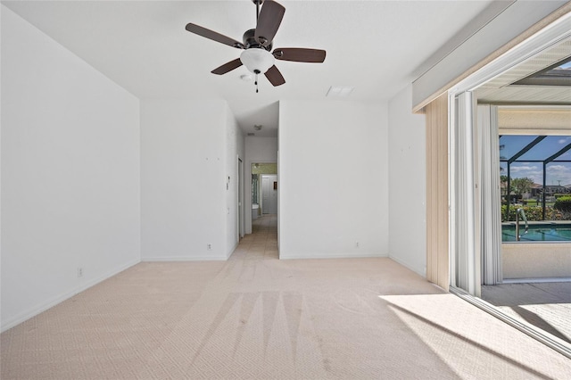 2719 Mayaguana Ct, Punta Gorda, FL 33950 - unfurnished room with light colored carpet, a ceiling fan, and baseboards