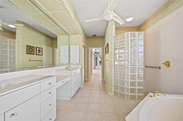 2719 Mayaguana Ct, Punta Gorda, FL 33950 - full bathroom featuring a ceiling fan, tile patterned floors, vanity, and walk in shower