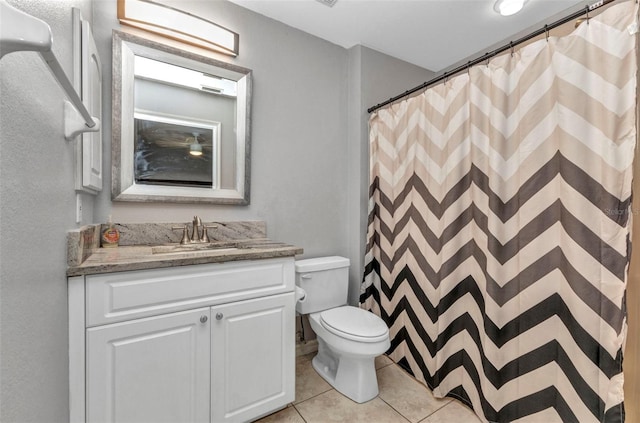 full bath with toilet, tile patterned floors, vanity, and a shower with curtain