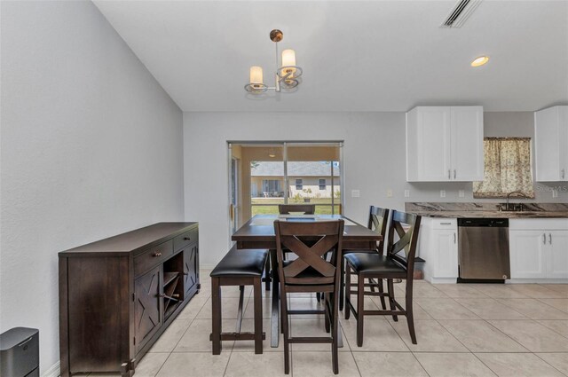 3647 Culpepper Ter, North Port, FL 34286 - dining room with a chandelier and light tile patterned floors