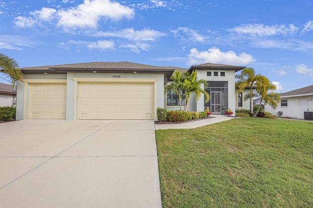 19246 Moore Haven Ct, Port Charlotte, FL 33948 - view of front of property with concrete driveway, an attached garage, stucco siding, and a front yard