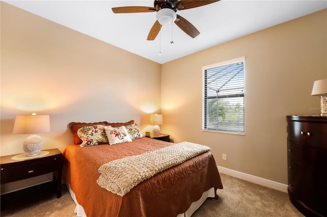 19246 Moore Haven Ct, Port Charlotte, FL 33948 - carpeted bedroom with baseboards and ceiling fan