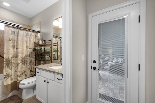 19246 Moore Haven Ct, Port Charlotte, FL 33948 - full bath with vanity, toilet, shower / bathtub combination with curtain, and tile patterned floors