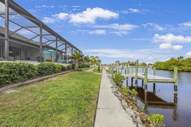 19246 Moore Haven Ct, Port Charlotte, FL 33948 - dock featuring a lawn, a water view, and a lanai