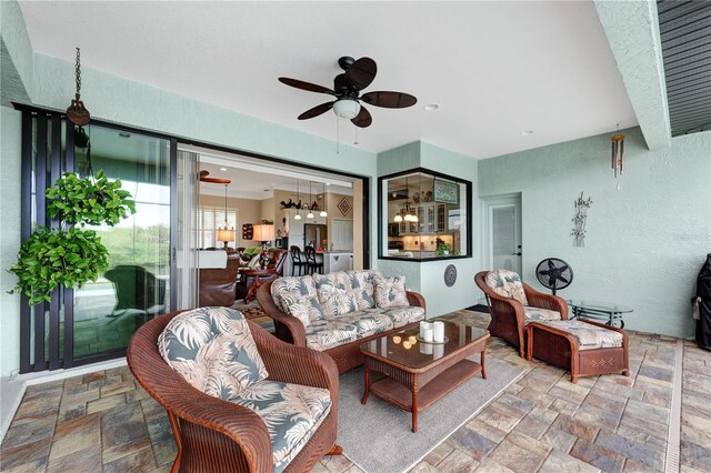 19246 Moore Haven Ct, Port Charlotte, FL 33948 - view of patio / terrace featuring ceiling fan and an outdoor living space