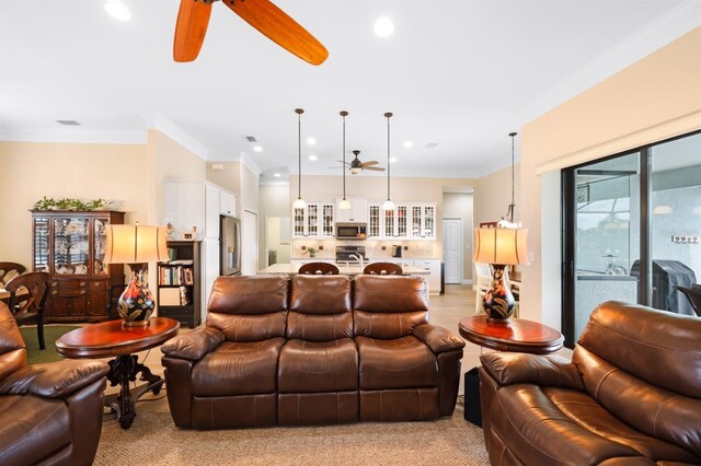 19246 Moore Haven Ct, Port Charlotte, FL 33948 - living area with ceiling fan, recessed lighting, and ornamental molding