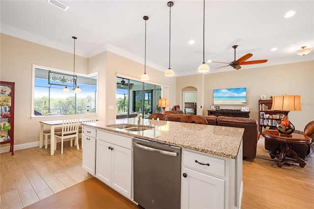 19246 Moore Haven Ct, Port Charlotte, FL 33948 - kitchen with dishwasher, ceiling fan, ornamental molding, light wood-style floors, and a sink