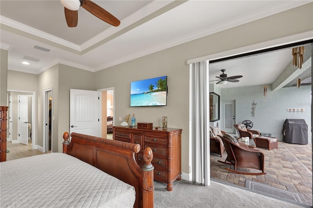 19246 Moore Haven Ct, Port Charlotte, FL 33948 - bedroom with crown molding, a raised ceiling, ceiling fan, and baseboards