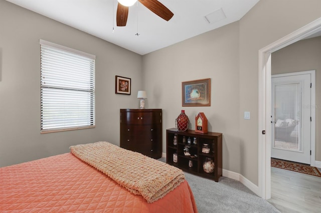 19246 Moore Haven Ct, Port Charlotte, FL 33948 - carpeted bedroom featuring baseboards and a ceiling fan