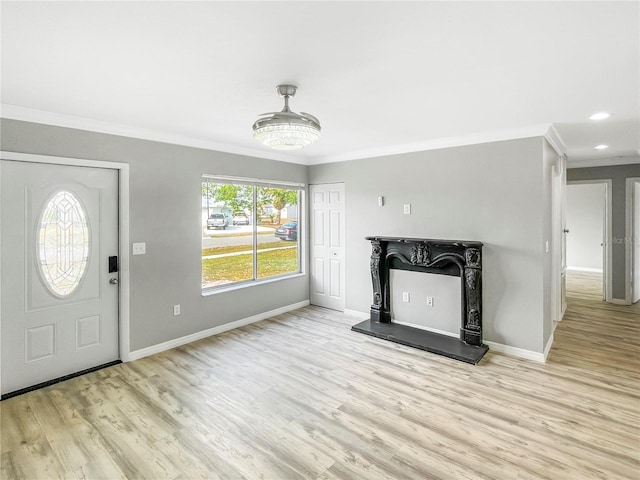 3342 Avanti Cir, North Port, FL 34287 - unfurnished living room featuring ornamental molding, wood finished floors, baseboards, and recessed lighting