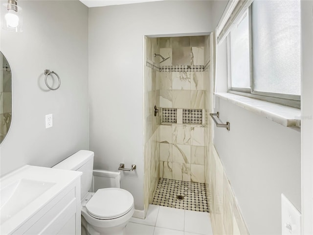 3342 Avanti Cir, North Port, FL 34287 - full bathroom featuring tiled shower, toilet, vanity, and tile patterned flooring