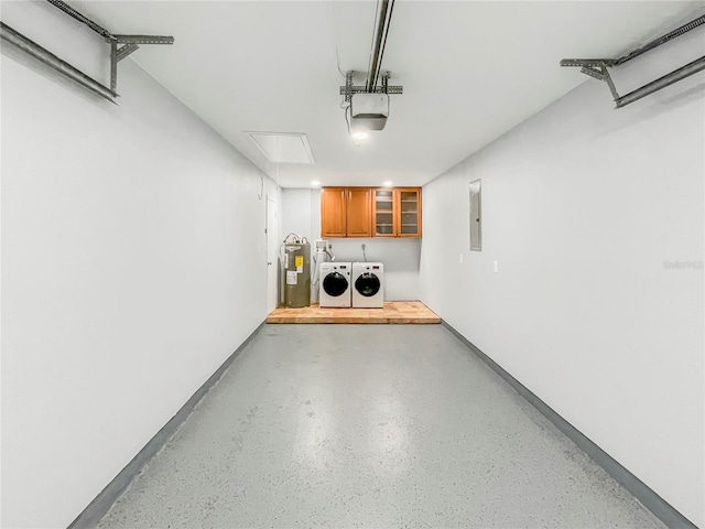 3342 Avanti Cir, North Port, FL 34287 - garage with washer and clothes dryer, water heater, electric panel, and a garage door opener