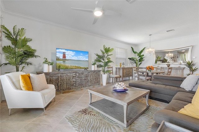 17620 Winding Wood Ln, Punta Gorda, FL 33982 - living room featuring ornamental molding, a chandelier, a ceiling fan, and light tile patterned floors