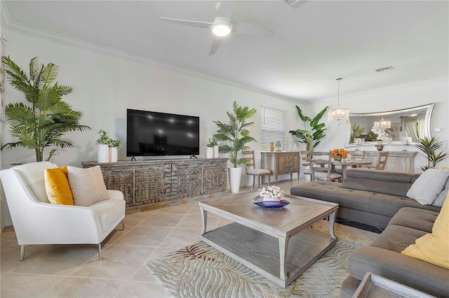 17620 Winding Wood Ln, Punta Gorda, FL 33982 - living area featuring ornamental molding, a chandelier, ceiling fan, and light tile patterned flooring
