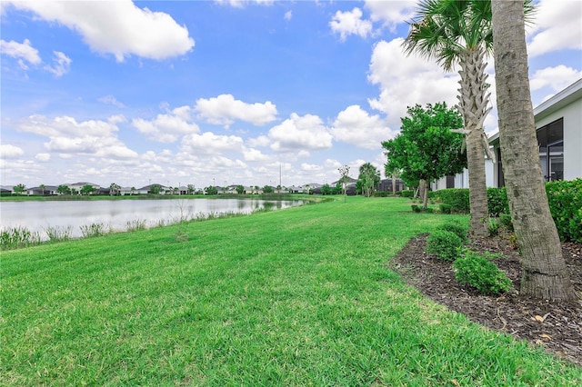 17620 Winding Wood Ln, Punta Gorda, FL 33982 - view of grassy yard featuring a water view