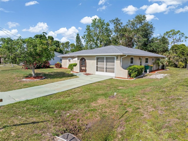 485 Dorchester St, Port Charlotte, FL 33954 - single story home with stucco siding and a front yard